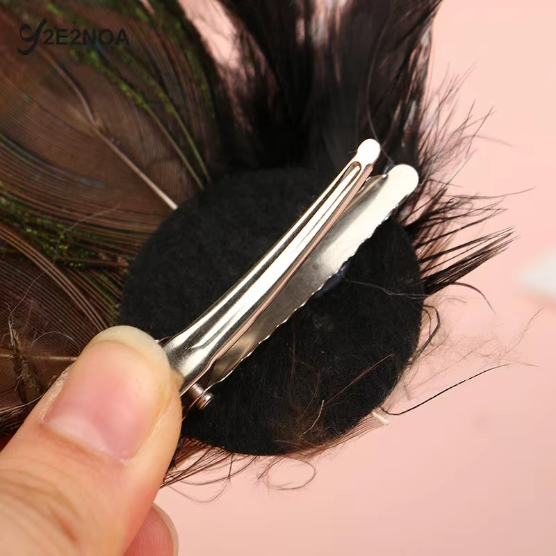 Pince à cheveux en plumes de paon pour filles