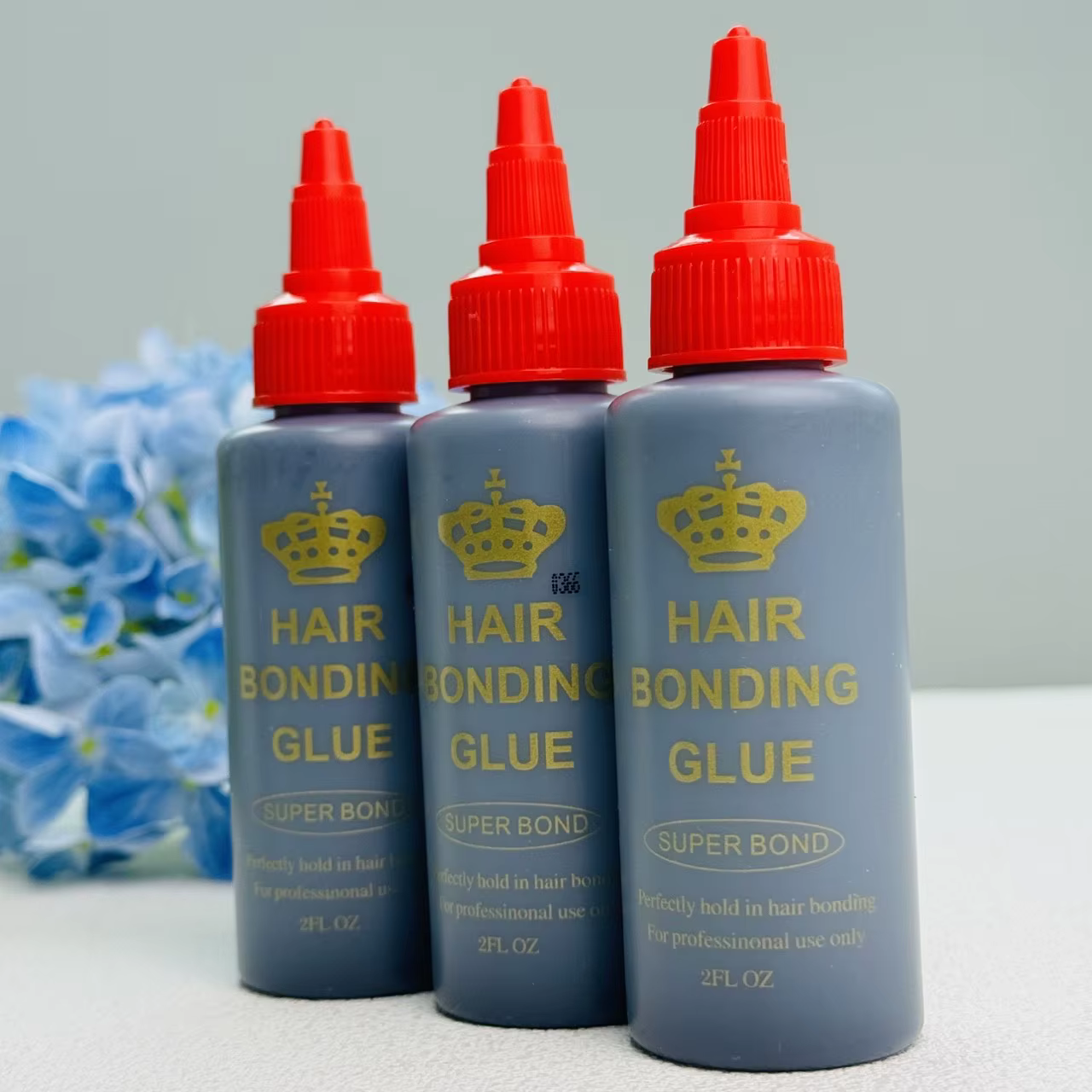 Colle noire pour tissage capillaire