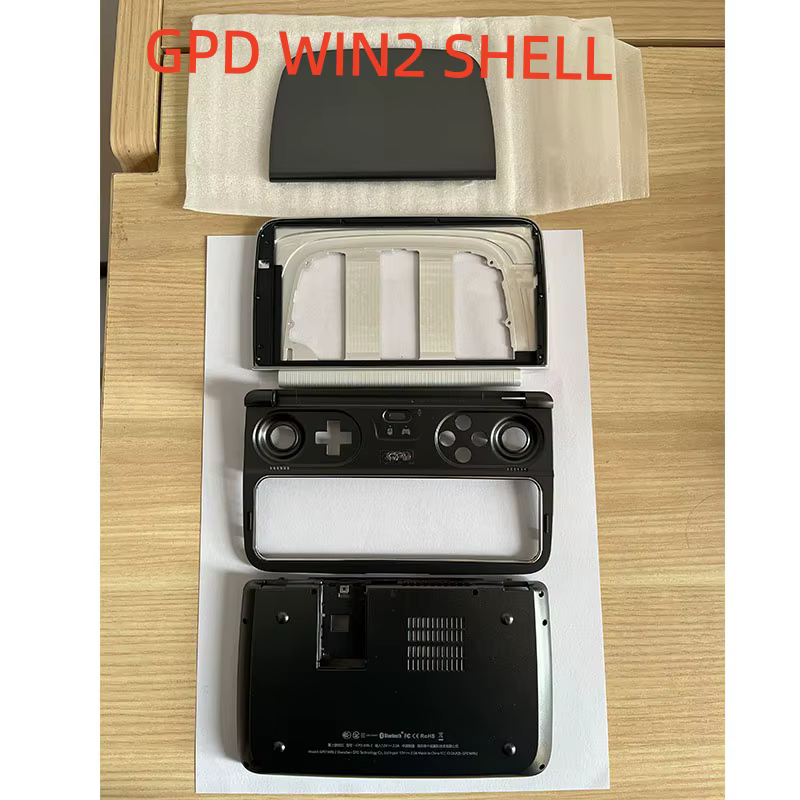 Véritable coque avant, coque arrière et coque extérieure GPD Win2. Les matériaux de coque sont catégalais ; veuillez confirmer votre achat.