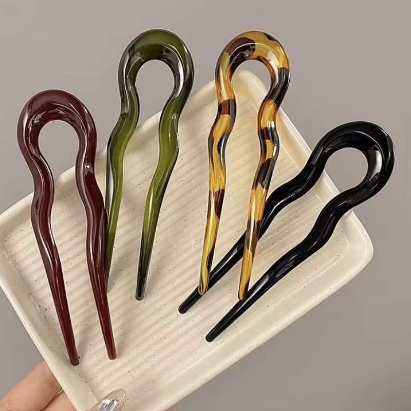 Pince à cheveux torsadée française en acétate