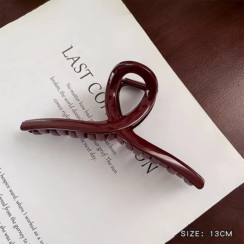 1 pince à cheveux rétro rouge foncé