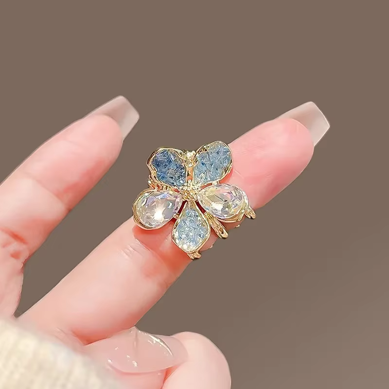 Petite griffe de cheveux en cristal bleu