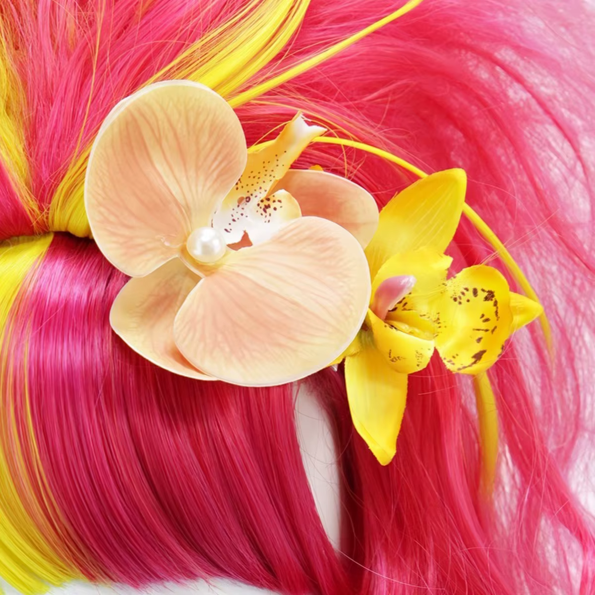Perruque synthétique longue bouclée dégradée jaune rose double ton avec postiche florale