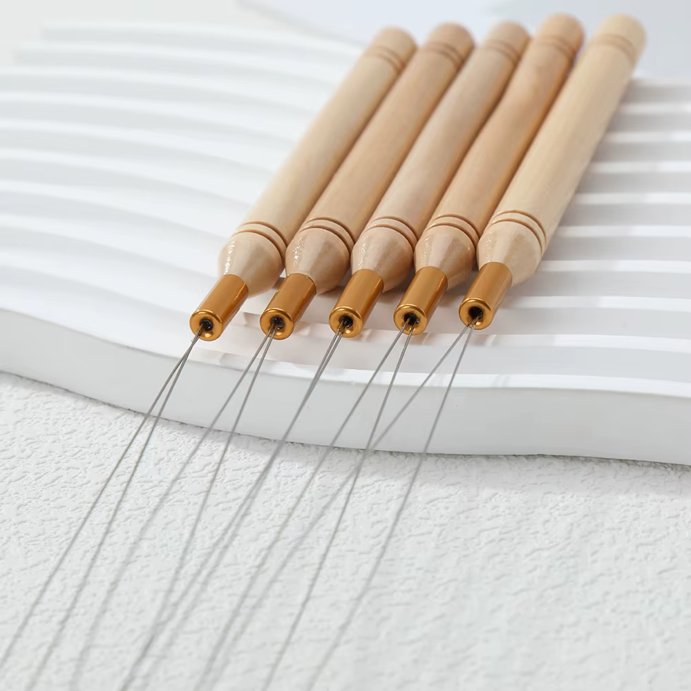 Outil de pose pour extensions capillaires : micro-anneaux