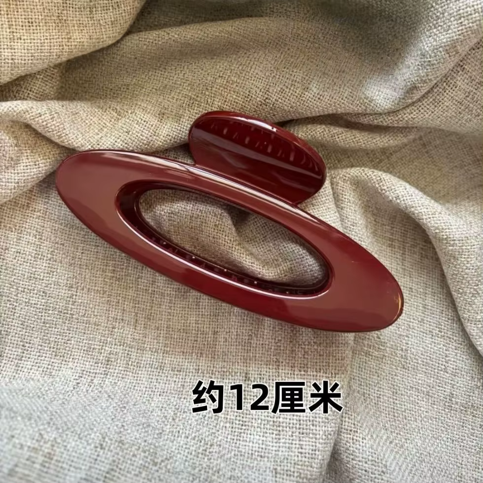Pince à cheveux Ellipse géométrique rouge à pois
