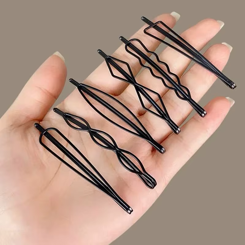 Épingles à cheveux noires ondulées