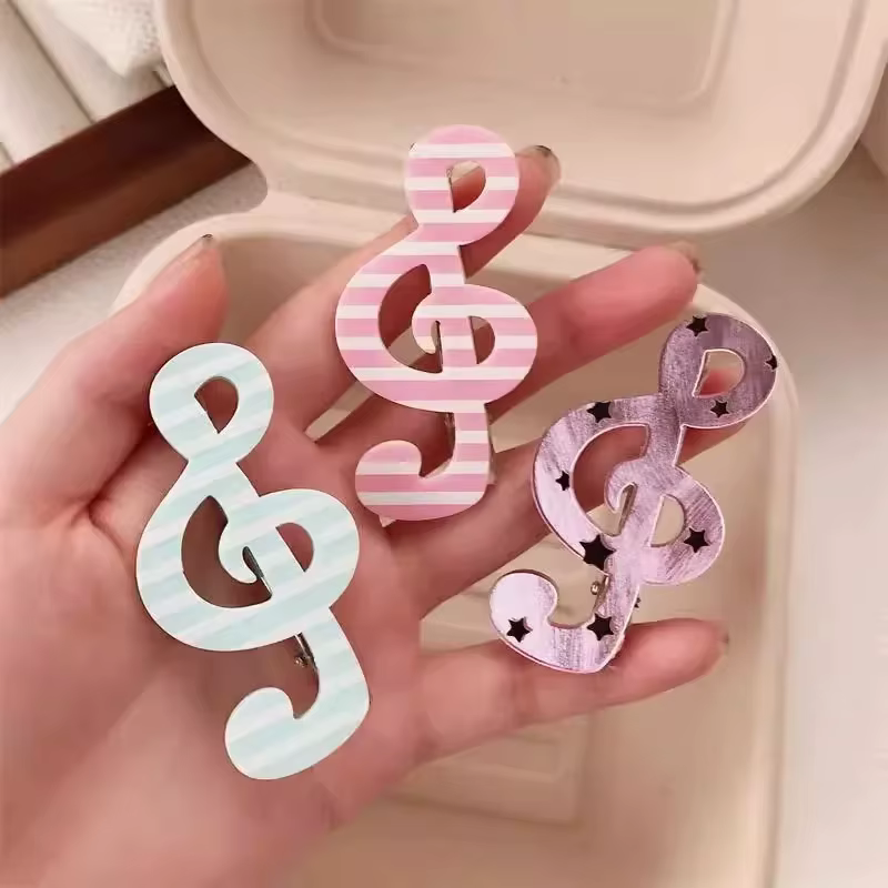 Barrettes à rayures et motifs musicaux pour filles