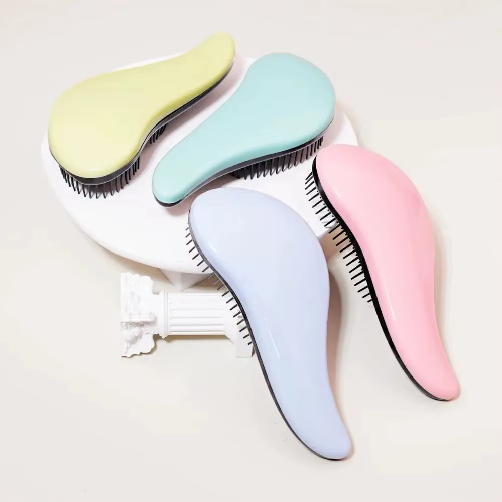 Brosse démêlante antistatique massante