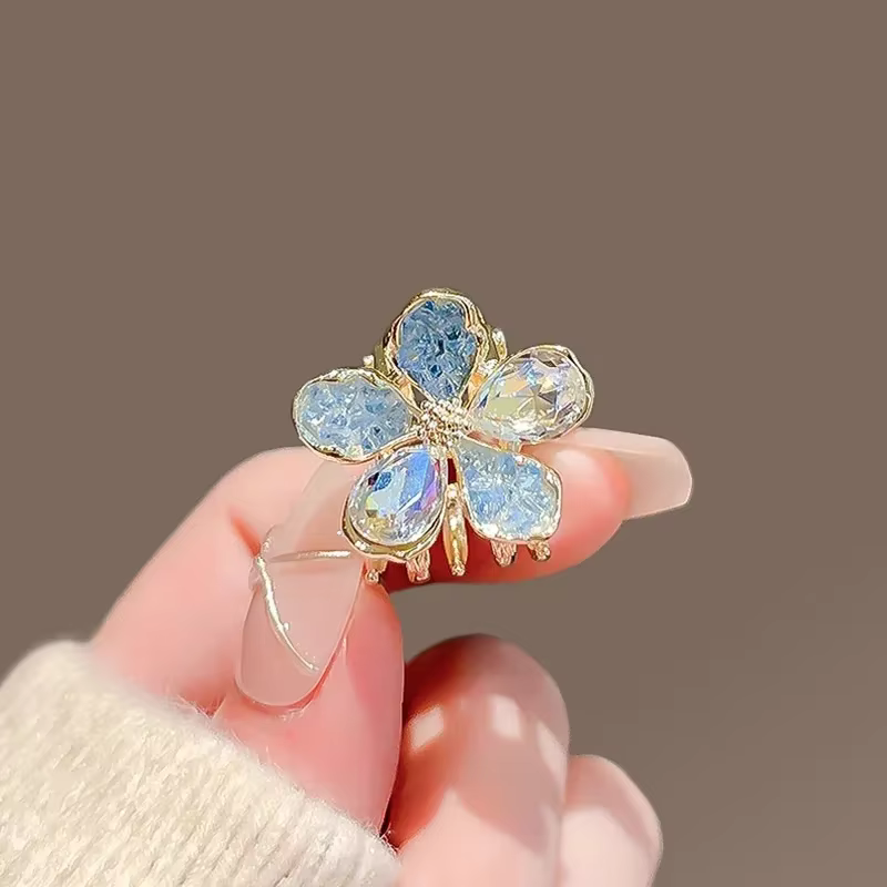 Petite griffe de cheveux en cristal bleu