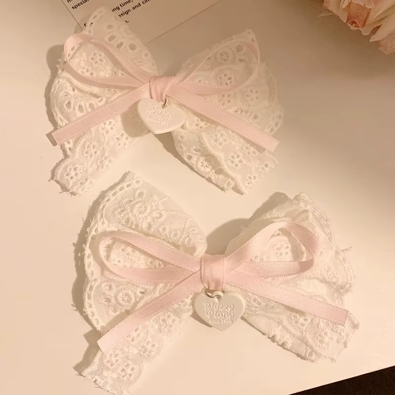Épingle à cheveux en dentelle avec nœud blanc