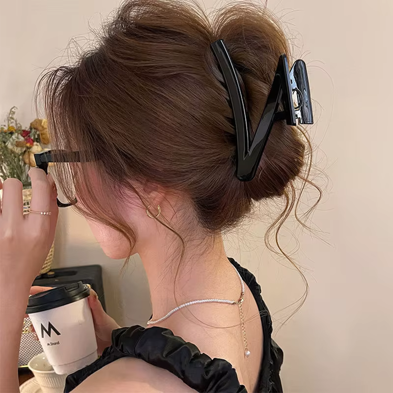 Pince à cheveux avec nœud en plastique