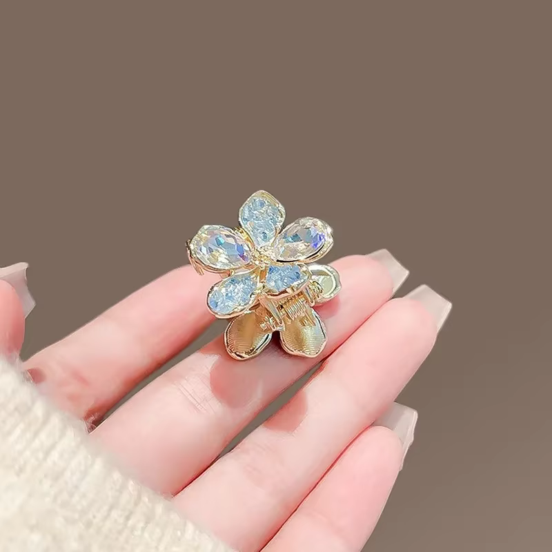 Petite griffe de cheveux en cristal bleu