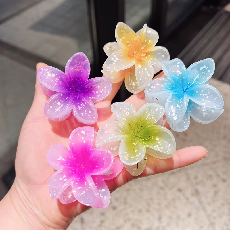 Pince à cheveux transparente à paillettes