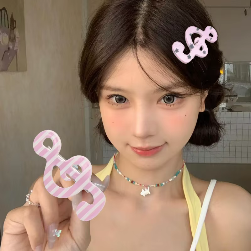 Barrettes à rayures et motifs musicaux pour filles