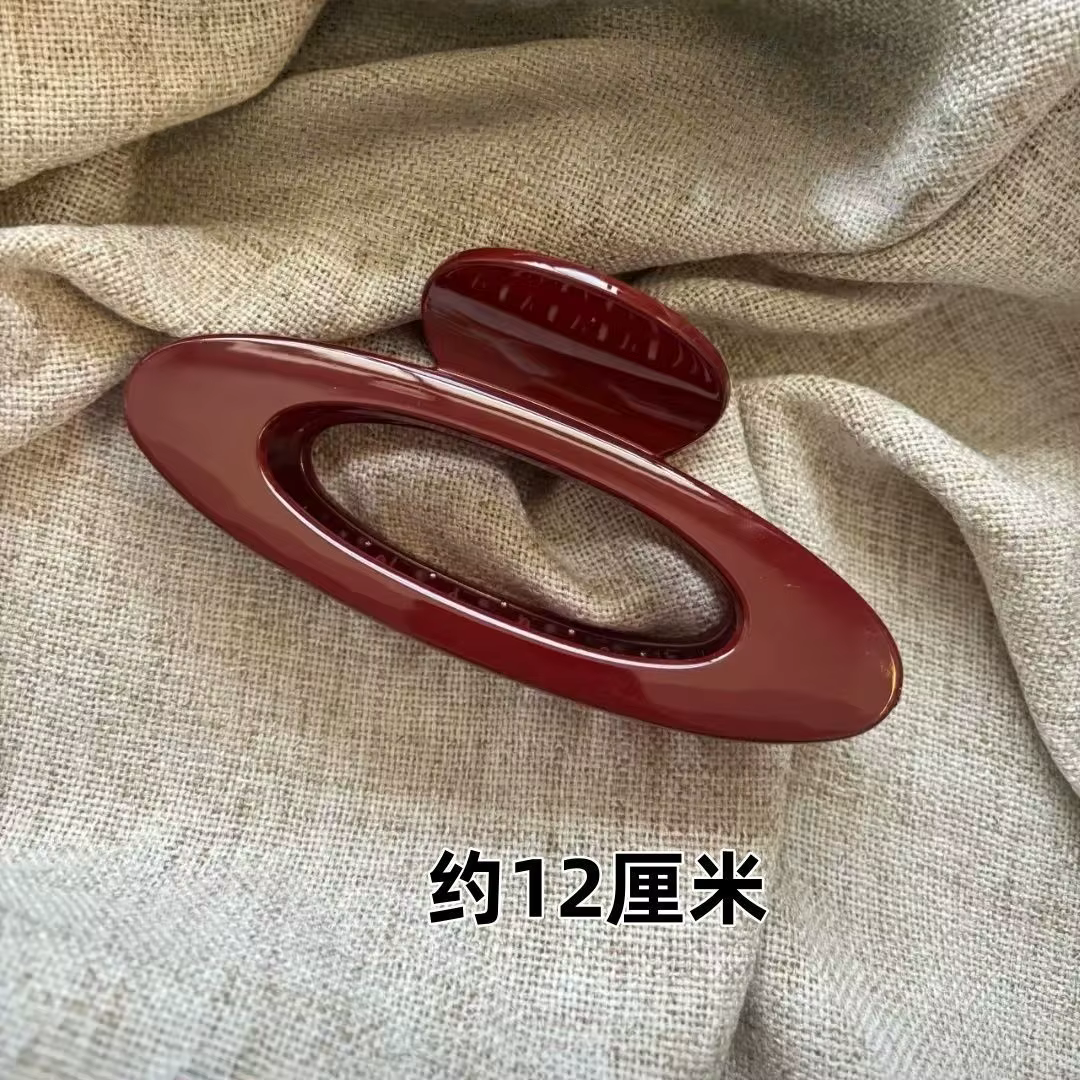 Pince à cheveux Ellipse géométrique rouge à pois