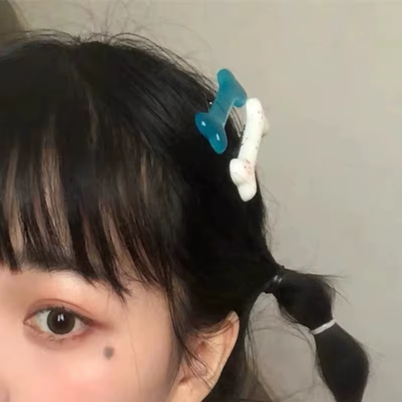 Pince à cheveux en os blanc