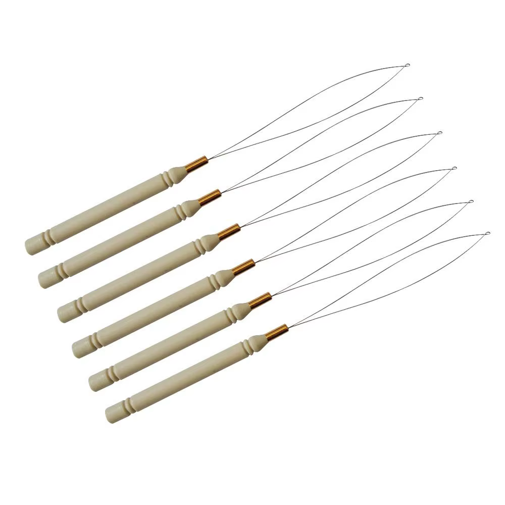Outil de pose d'extensions capillaires : micro-anneaux